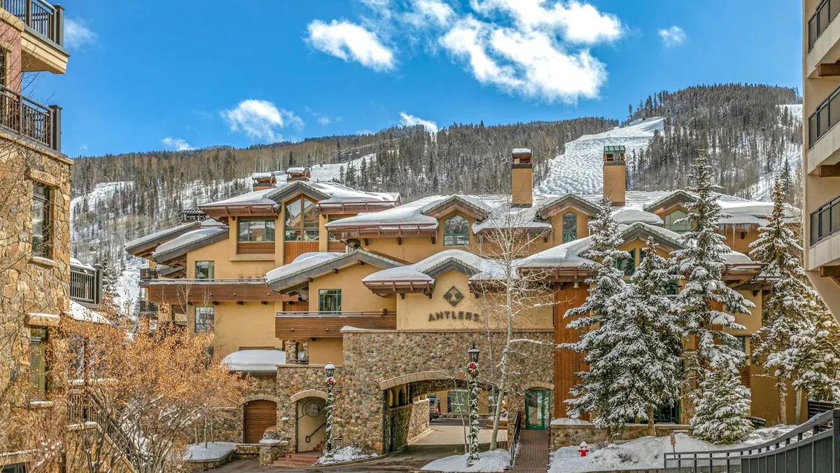 Antlers at Vail condominiums beside Gore Creek in Lionshead
